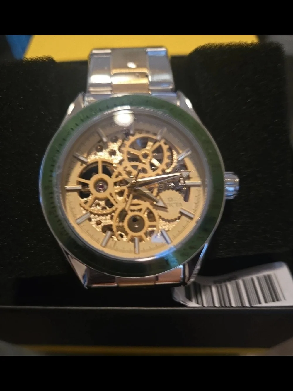 Invicta Two-Tone Skeleton Dial Watch with Green Bezel
